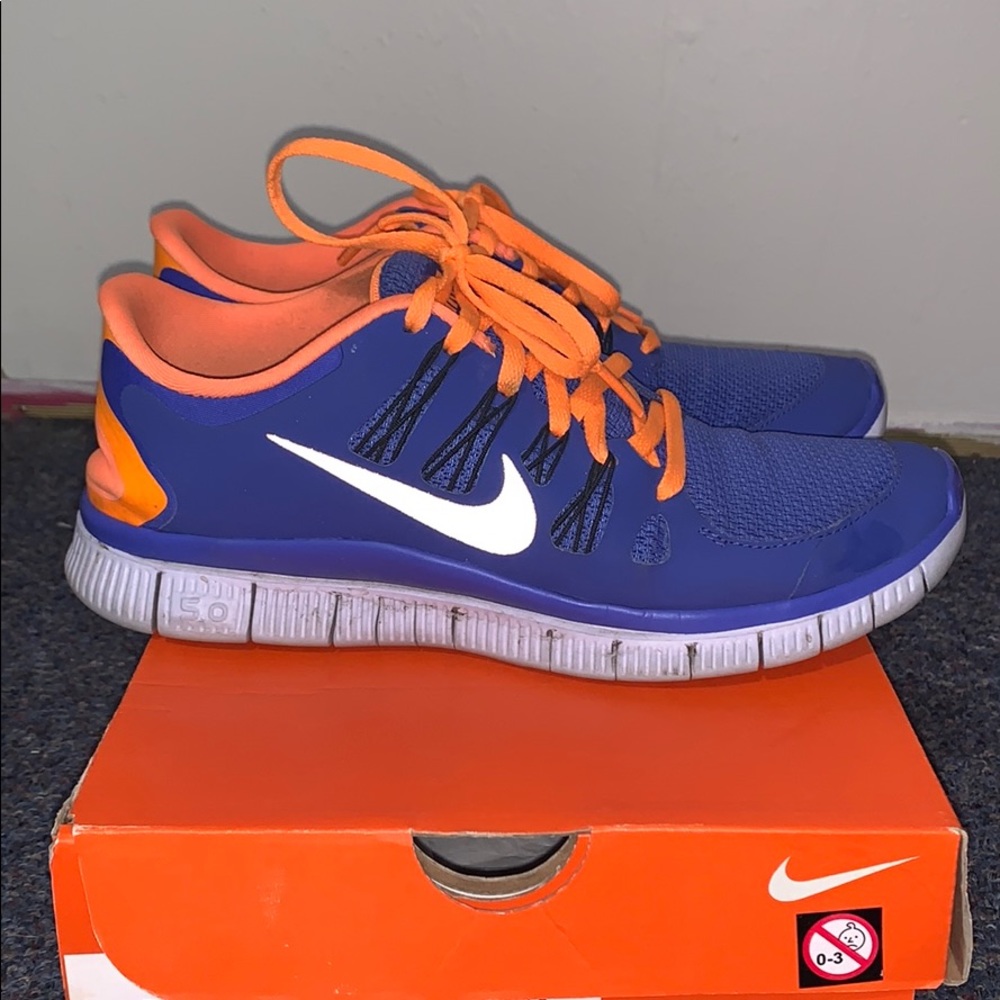 Blue and orange Nike Free